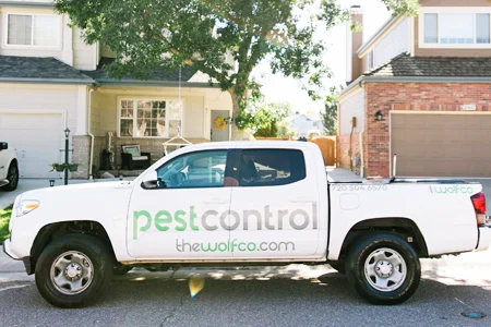 WolfCo truck in front of house