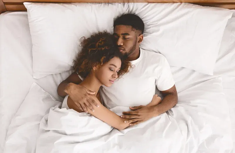 couple sleeping peacefully in bed bug free bed