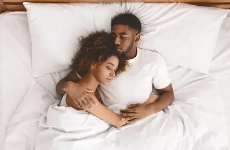 couple sleeping peacefully in bed bug free bed