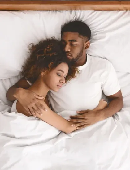 couple sleeping peacefully in bed bug free bed